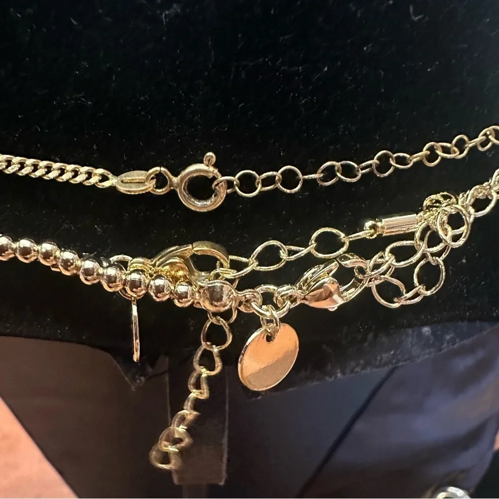 The sis kiss gold tone triple layered signed necklace with original box
